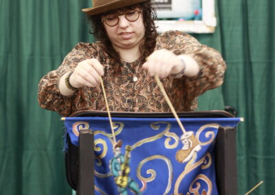 Sara McNeil Performing Stray Cat Strut at Market Collective April 2023